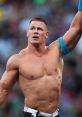 John Cena celebrates after a victory, showcasing his iconic physique and determination in the wrestling ring.