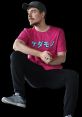 Mr. Beast in a bright pink shirt, sitting casually, showcasing his unique style and casual demeanor.