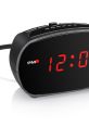 Sleek digital alarm clock with red LED display, perfect for keeping time and ensuring punctual wake-ups.