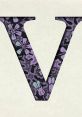 Decorative letter "V" with floral purple pattern on a textured background, perfect for typography and design inspiration.