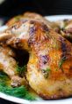 Juicy grilled chicken thighs garnished with fresh herbs, showcasing a delicious golden-brown glaze and smoky flavor.