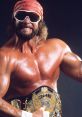 Macho Man poses proudly with the championship belt, showcasing his iconic style and muscular physique in wrestling history.