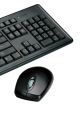 Black computer keyboard and mouse, featuring a sleek design and essential keys for efficient productivity and comfort.