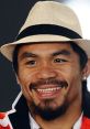 Manny Pacquiao smiling with a stylish hat, embodying charisma and charm in a vibrant setting.