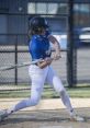 Athlete in blue RBHS Softball uniform swings bat, showcasing skill and focus on the field during a game.