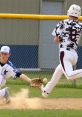 Platte Geddes baseball players in action as a runner slides into base while the fielder prepares to catch a thrown ball.