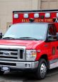 Red ambulance from Bellingham Fire Department with emergency lights, showcasing public safety response vehicle.