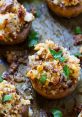 Savory stuffed mushrooms topped with crispy breadcrumbs, a perfect dish to complement "All Hail the Gravy" recipes.