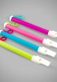 Colorful slide whistles in shades of pink, blue, and green, perfect for music-making and playful sound effects.