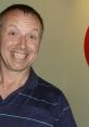 Cheerful announcer at a darts club, showcasing excitement and enthusiasm for the game in a vibrant setting.