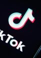 Close-up of the TikTok logo with vibrant colors on a dark background, showcasing the platform's branding and design.