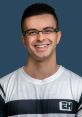 Smiling young man wearing a striped shirt with "EH" logo, showcasing a friendly and approachable demeanor.