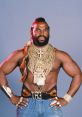 Mr. T flaunts his iconic style, showcasing an array of gold chains and fierce attitude, embodying 80s pop culture.