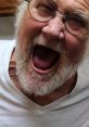 Angry Grandpa passionately expressing his iconic animated rage in a close-up with a humorous flair and distinct white beard.