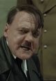 Adolf Hitler expressing intense emotions in a pivotal scene from "Der Untergang" (Downfall) film.