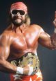 Randy Savage flexing muscles, wearing sunglasses and bandana, proudly holding the championship belt, showcasing his wrestling legacy.