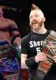 WWE champions celebrating with their championship belts, showcasing athleticism and charisma in the ring.