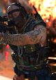 Engaged soldier in tactical gear wielding a gun, showcasing tattoos and intense battlefield atmosphere in Call of Duty Warzone.