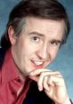 Alan Partridge with a playful expression, showcasing his humorous persona from "Alan's Deep Learning.