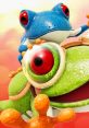 Colorful frogs from Frogger in Toy Town, featuring a blue frog on top of a green frog with vibrant red eyes.