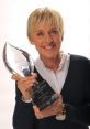 Ellen Degeneres proudly holds the People’s Choice Award, celebrating her impact as a beloved talk show host.