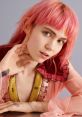 Grimes showcases her playful style with vibrant pink hair and a vintage-inspired outfit, radiating artistic flair.