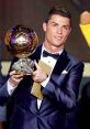 Cristiano Ronaldo proudly holds the Ballon d'Or trophy, showcasing his achievement in football excellence and skill.