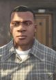 Franklin Clinton in a plaid shirt, showcasing detailed character design from the game, with a focused expression.