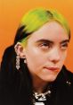 Billie Eilish showcases her signature green hair and edgy style against a vibrant orange background, capturing her unique aesthetic.