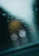 Raindrops You can immerse yourself in the soothing symphony of raindrops falling on a car parked under a vine, creating a