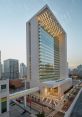 Court The of a bustling food court in the mall can be heard in the background, as people chatter and the clinking of