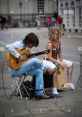 Busking You can hear the lively melodies of a Russian Accordionist filling the streets of Moscow as he busks for