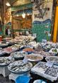 Fish-Market The cacophony of at a fish market is both chaotic and captivating, each one adding to the lively atmosphere