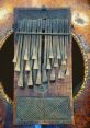 African-Thumb-Piano The melodious notes of the African Thumb Piano resonate through the air, captivating listeners with