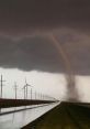 Tornado The piercing wail of the tornado siren cuts through the stillness of the air, a chilling reminder of the impending