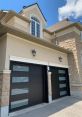 Garage-Door The symphony of that accompanies the opening of a garage door is a melodic blend of mechanical precision and