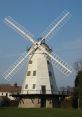 Windmill These windmill transport you to a world where the gentle hum of the wind meets the creaking andueaking of metal