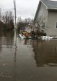 Flooding In the midst of a flooding emergency in Nanterre, France, the of a toilet flush fills the air. R4 00598 Fr