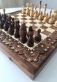 Chess The unmistakable of chess pieces moving far away can be both calming and suspenseful. Each tap of a piece against the