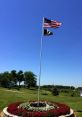 Flagpole The of the flagpole line hitting the pole in the wind create a mesmerizing rhythm that is both soothing and