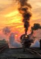 Steam-Train The rhythmic chuffing of a steam train going uphill at speed echoes through the countryside, a both nostalgic