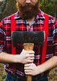 Lumberjack The lumberjack sweats as he swings his sharp axe, the crisp of metal slicing through wood echoing through the