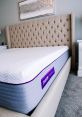 Matress The of moving the mattress on the bed frame fills the room, echoing off the walls with a fast-paced rhythm. The