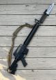 M16A2 The distinct of an M16A2 firing three single rounds rings out in the field, echoing through the vast expanse. The