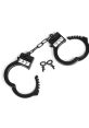 Handcuffs The of handcuffs clicking shut is unmistakable. It echoes through the room, a sharp, final punctuation mark to