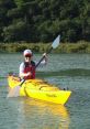 Kayak The of water gently lapping against the sides of the kayak creates a soothing rhythm as the paddler glides across the