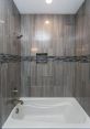 Bathtub The of water pouring into the bathtub creates a soothing ambiance, as it fills the space with a gentle and