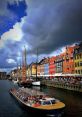 Harbor In the tranquil setting of a seaside harbor, the gentle lapping of the waves against the dock provides a soothing