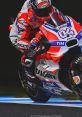 Motogp The roaring of the engines fills the air as the Motogp racers speed around the track. The intense vibrations from