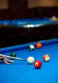 Cue-Ball The of a pool cue hitting a cue ball resonate throughout the room with a satisfying "thwack". The impact is